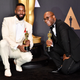 Screenwriter Tarell Alvin McCraney and writer-director Barry Jenkins, winners of Best Adapted Screenplay for Moonlight, pose in the pressroom during the 89th Annual Academy Awards at Hollywood & Highland Center on Feb. 26, 2017, in Hollywood, Calif.